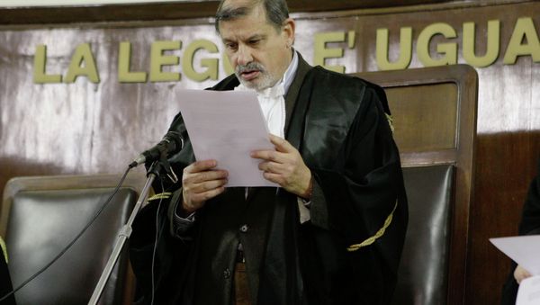 Judge Sergio Silocchi reads the sentence of the appeal trial on a CIA-led kidnapping of an Egyptian terror suspect, Muslim cleric Osama Moustafa Hassan Nasr, also known as Abu Omar, at the Milan's court, Italy, Wednesday, Dec. 15, 2010. - Sputnik International