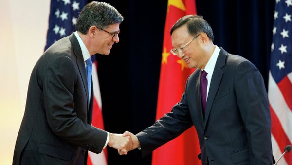 US Treasury Secretary Jack Lew shakes hands with China's State Councilor Yang Jiechi at the 7th US China Strategic and Economic Dialogue in Washington. US Treasury Secretary Jack Lew shakes hands with China's State Councilor Yang Jiechi at the 7th US China Strategic and Economic Dialogue in Washington. - Sputnik International