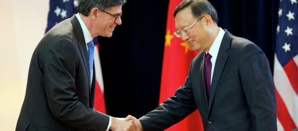 US Treasury Secretary Jack Lew shakes hands with China's State Councilor Yang Jiechi at the 7th US China Strategic and Economic Dialogue in Washington. US Treasury Secretary Jack Lew shakes hands with China's State Councilor Yang Jiechi at the 7th US China Strategic and Economic Dialogue in Washington. - Sputnik International