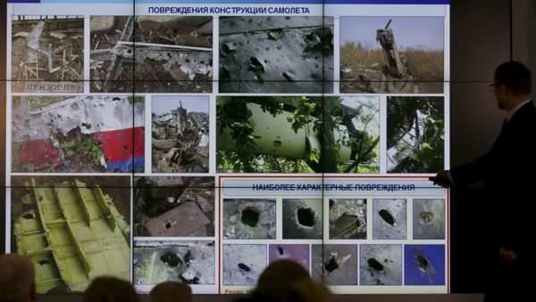 People attend a news conference, organized by officials of Russian missile manufacturer Almaz-Antey and dedicated to the Malaysia Airlines flight MH17 crash, in Moscow, Russia, June 2, 2015 - Sputnik International