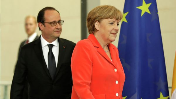 German Chancellor Angela Merkel, right, and the President of France, Francois Hollande, left, arrive for a joint press conference as part of a meeting at the Chancellery in Berlin, Germany, Tuesday, May 19, 2015 German Chancellor Angela Merkel, right, and the President of France, Francois Hollande, left, arrive for a joint press conference as part of a meeting at the Chancellery in Berlin, Germany, Tuesday, May 19, 2015 - Sputnik International