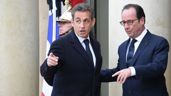 French President Francois Hollande (R) welcomes France's former President and leader of the right-wing UMP party Nicolas Sarkozy (L) at the Elysee Palace before attending a Unity rally “Marche Republicaine” on January 11, 2015 French President Francois Hollande (R) welcomes France's former President and leader of the right-wing UMP party Nicolas Sarkozy (L) at the Elysee Palace before attending a Unity rally “Marche Republicaine” on January 11, 2015 - Sputnik International