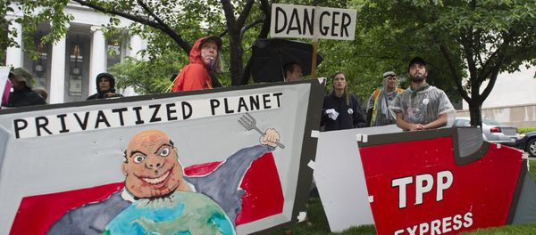 Demonstrators protest against the legislation to give US President Barack Obama fast-track authority to advance trade deals, including the Trans-Pacific Partnership (TPP), during a protest march on Capitol Hill in Washington - Sputnik International