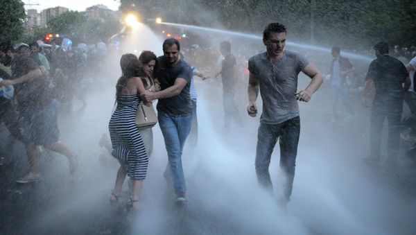 Armenian police use water cannons to disperse protesters demonstrating against an increase in electricity prices in the Armenian capital of Yerevan, Tuesday, June 23, 2015 Armenian police use water cannons to disperse protesters demonstrating against an increase in electricity prices in the Armenian capital of Yerevan, Tuesday, June 23, 2015 - Sputnik International