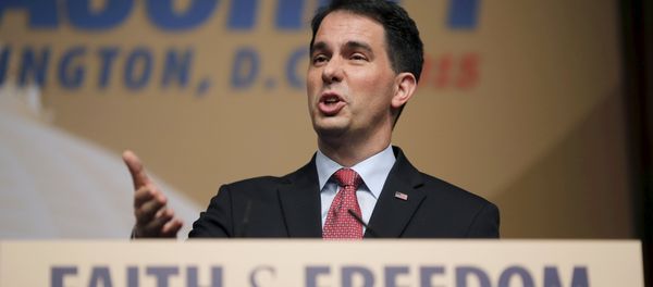 Wisconsin Governor and Republican presidential candidate Scott Walker addresses supporters during a dinner at the Road to Majority conference in Washington June 20, 2015 Wisconsin Governor and Republican presidential candidate Scott Walker addresses supporters during a dinner at the Road to Majority conference in Washington June 20, 2015 - Sputnik International