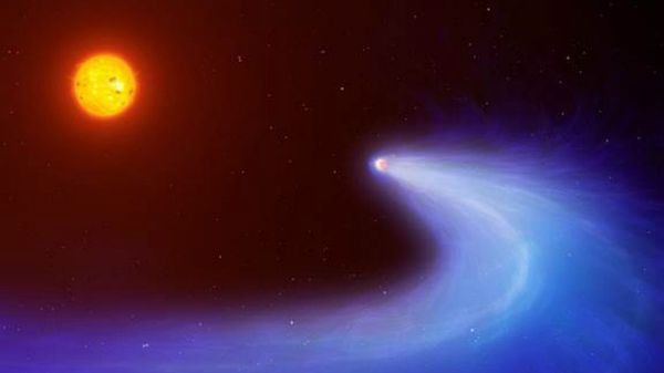 This artist's impression shows exoplanet GJ 436b, which is surrounded by a massive gas cloud that streams behind the planet like a comet's tail for millions of miles - Sputnik International
