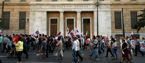 Members of the Communist-affiliated PAME labor union pass in front of the Bank of Greece during an anti-austerity protest in Athens on Tuesday, June 23, 2015 Members of the Communist-affiliated PAME labor union pass in front of the Bank of Greece during an anti-austerity protest in Athens on Tuesday, June 23, 2015 - Sputnik International