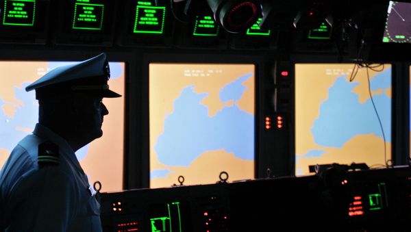 A US Navy officer, name not available, looks on at the weapons control deck of the USS Monterey in the Black Sea port of Constanta, Romania, Tuesday, June 7, 2011 A US Navy officer, name not available, looks on at the weapons control deck of the USS Monterey in the Black Sea port of Constanta, Romania, Tuesday, June 7, 2011 - Sputnik International