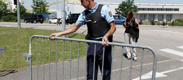 A French Gendarme blocks the access road to the Saint-Quentin-Fallavier industrial area, near Lyon, France, June 26, 2015 A French Gendarme blocks the access road to the Saint-Quentin-Fallavier industrial area, near Lyon, France, June 26, 2015 - Sputnik International