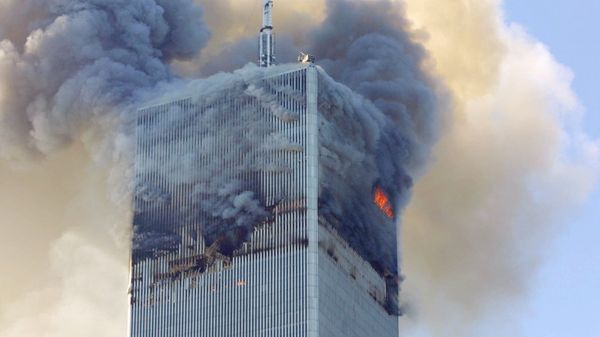 Fire and smoke billows from the north tower of New York's World Trade Center Tuesday Sept. 11, 2001 after terrorists crashed two hijacked airliners into the World Trade Center and brought down the twin 110-story towers. - Sputnik International