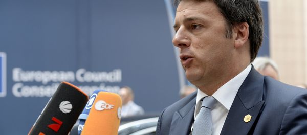 Italian Prime Minister Matteo Renzi speaks with journalists as he arrives for day two of an EU summit at the EU Headquarters in Brussels on June 26, 2015 Italian Prime Minister Matteo Renzi speaks with journalists as he arrives for day two of an EU summit at the EU Headquarters in Brussels on June 26, 2015 - Sputnik International