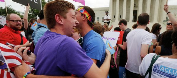 Gay rights supporters celebrate after the U.S. Supreme Court ruled that the U.S. Constitution provides same-sex couples the right to marry, outside the Supreme Court building in Washington, June 26, 2015 Gay rights supporters celebrate after the U.S. Supreme Court ruled that the U.S. Constitution provides same-sex couples the right to marry, outside the Supreme Court building in Washington, June 26, 2015 - Sputnik International