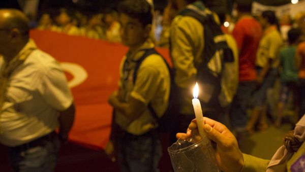 A boy scout holds a candle - Sputnik International