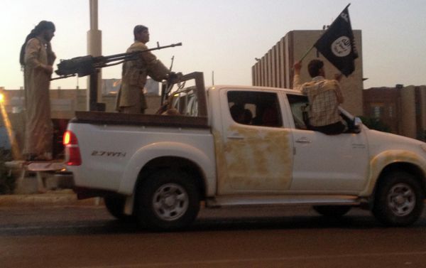 Islamic State militants parade in a commandeered Iraqi security forces vehicle on a main road at the northern city of Mosul. Islamic State militants parade in a commandeered Iraqi security forces vehicle on a main road at the northern city of Mosul. - Sputnik International
