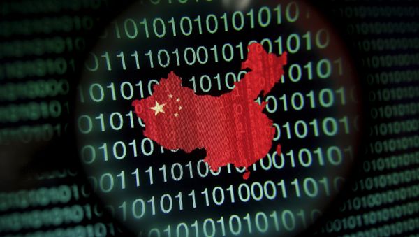 A map of China is seen through a magnifying glass on a computer screen showing binary digits in Singapore in this January 2, 2014 file photo illustration - Sputnik International