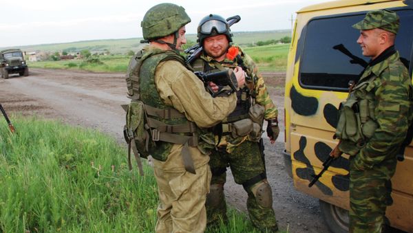 A battalion reconnaissance unit of the Donestsk People's Republic's armed forces photographed near the village of Shirokino A battalion reconnaissance unit of the Donestsk People's Republic's armed forces photographed near the village of Shirokino - Sputnik International