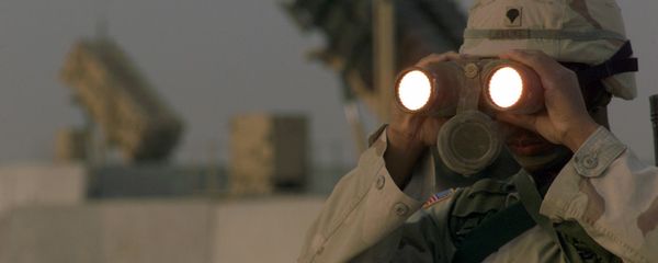 US soldier uses a pair of binoculars to scans the landscape around his Patriot Missiles based at Al Udeid AB, Qatar US soldier uses a pair of binoculars to scans the landscape around his Patriot Missiles based at Al Udeid AB, Qatar - Sputnik International