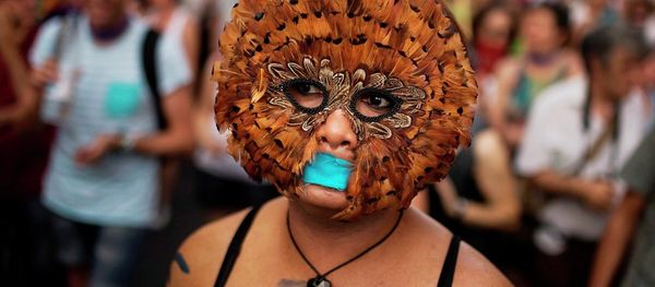 A protester takes part in a march against the Public Security Law gag law in Madrid, Spain, Tuesday, June 30, 2015. A protester takes part in a march against the Public Security Law gag law in Madrid, Spain, Tuesday, June 30, 2015. - Sputnik International
