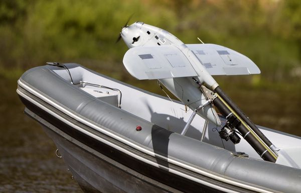 An airplane-type drone is launched from the BK-10 motor boat at the Army 2015 International Military-Technical Forum in Kubinka - Sputnik International
