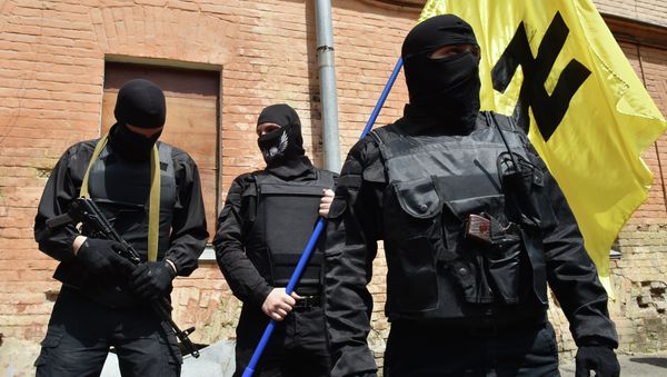 Fighters of Social Nationalist Assembly (SNA), part of the ultra-nationalist Right Sector party, attend a swearing-in ceremony in Kiev prior to leaving on June 3, 2014 - Sputnik International
