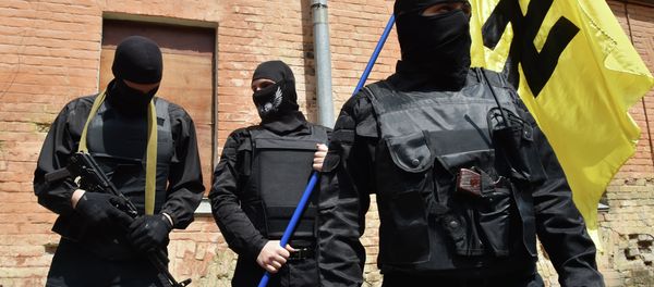 Fighters of Social Nationalist Assembly (SNA), part of the ultra-nationalist Right Sector party, attend a swearing-in ceremony in Kiev prior to leaving on June 3, 2014 Fighters of Social Nationalist Assembly (SNA), part of the ultra-nationalist Right Sector party, attend a swearing-in ceremony in Kiev prior to leaving on June 3, 2014 - Sputnik International