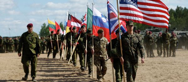 Soldiers from NATO countries attend an opening ceremony of military exercise 'Saber Strike 2015'. - Sputnik International