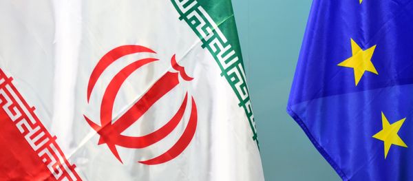 An Iranian (L) and a European flag An Iranian (L) and a European flag - Sputnik International