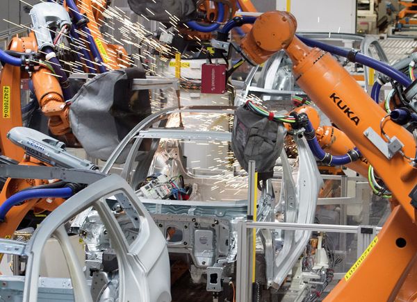 Robots weld a car body at the plant of the German car manufacturer Volkswagen Sachsen in Germany, Monday, Jan. 26, 2015 Robots weld a car body at the plant of the German car manufacturer Volkswagen Sachsen in Germany, Monday, Jan. 26, 2015 - Sputnik International