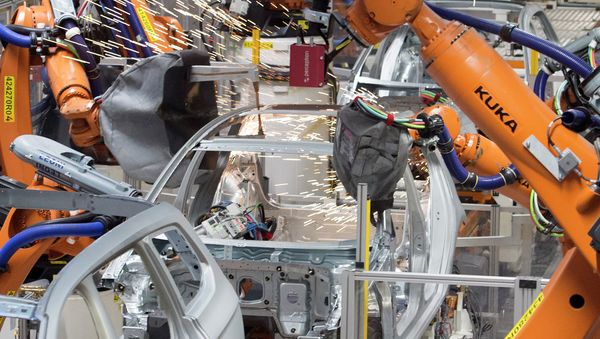 Robots weld a car body at the plant of the German car manufacturer Volkswagen Sachsen in Germany, Monday, Jan. 26, 2015 Robots weld a car body at the plant of the German car manufacturer Volkswagen Sachsen in Germany, Monday, Jan. 26, 2015 - Sputnik International