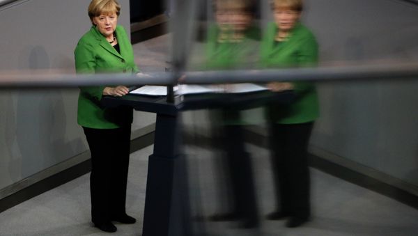 German Chancellor Angela Merkel delivers her speech at the German parliament Bundestag in Berlin. German Chancellor Angela Merkel delivers her speech at the German parliament Bundestag in Berlin. - Sputnik International