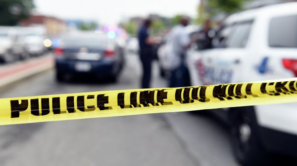 Police officers work behind police tape blocking a street near the Washington Navy Yard in Washington, Thursday, July 2, 2015 - Sputnik International