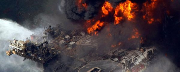 In this April 21, 2010 file photo taken in the Gulf of Mexico more than 50 miles southeast of Venice on Louisiana's tip, the Deepwater Horizon oil rig is seen burning In this April 21, 2010 file photo taken in the Gulf of Mexico more than 50 miles southeast of Venice on Louisiana's tip, the Deepwater Horizon oil rig is seen burning - Sputnik International