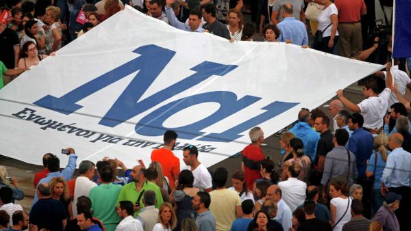 The word 'Yes' in Greek is seen on a banner during a pro-Euro rally in front of the parliament building, in Athens, Greece, June 30, 2015 The word 'Yes' in Greek is seen on a banner during a pro-Euro rally in front of the parliament building, in Athens, Greece, June 30, 2015 - Sputnik International