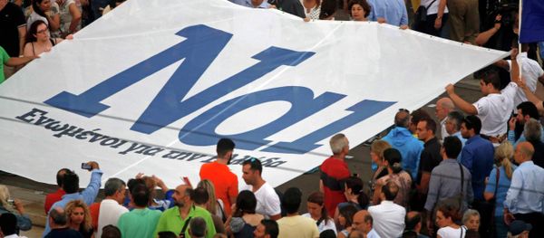 The word 'Yes' in Greek is seen on a banner during a pro-Euro rally in front of the parliament building, in Athens, Greece, June 30, 2015 The word 'Yes' in Greek is seen on a banner during a pro-Euro rally in front of the parliament building, in Athens, Greece, June 30, 2015 - Sputnik International