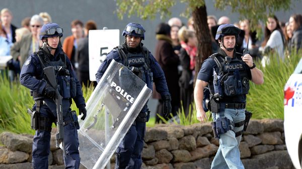 June 30, 2015 photo, police walk outside Ravenhall Prison in Melbourne, Australia - Sputnik International