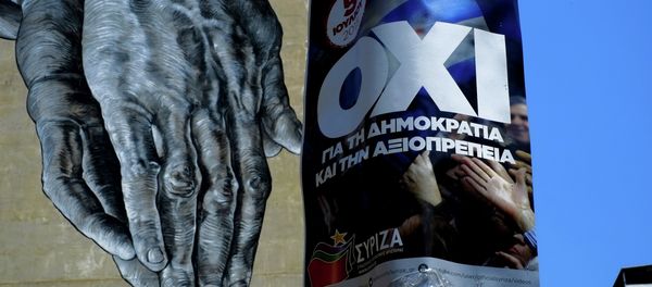 Hands painted on the wall of a building seen behind a poster for a NO vote in the upcoming referendum, in central Athens, Wednesday, July 1, 2015. - Sputnik International