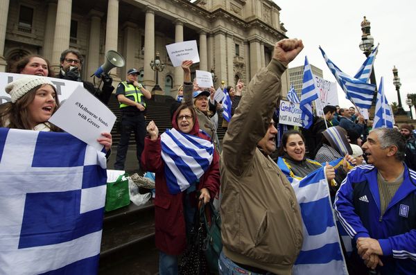 Protestors wave the Greek flag as they shout Oxi (No) during the Melbourne stands with Greece solidarity rally outside Parliament House in Melbourne on July 4, 2015 Protestors wave the Greek flag as they shout Oxi (No) during the Melbourne stands with Greece solidarity rally outside Parliament House in Melbourne on July 4, 2015 - Sputnik International