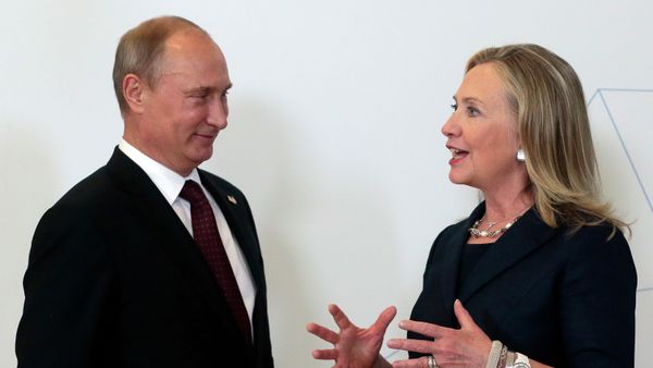 Russian President Vladimir Putin, left, meets U.S. Secretary of State Hillary Rodham Clinton on her arrival at the APEC summit in Vladivostok, Russia, Saturday, Sept. 8, 2012. Russian President Vladimir Putin, left, meets U.S. Secretary of State Hillary Rodham Clinton on her arrival at the APEC summit in Vladivostok, Russia, Saturday, Sept. 8, 2012. - Sputnik International