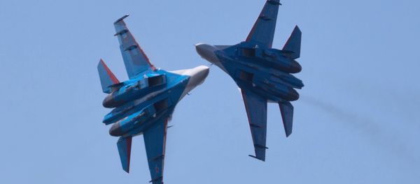 Russian Vikings aerobatics team performing on board SU-27 planes at the opening ceremony of the Fifteenth International Maritime Defense Show in St.Petersburg. - Sputnik International