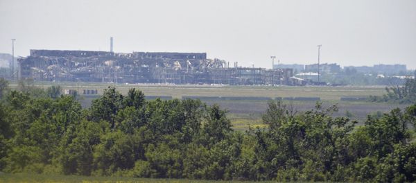 A view from the positions of the Ukrainian armed forces shows the local airport outside Donetsk, Ukraine A view from the positions of the Ukrainian armed forces shows the local airport outside Donetsk, Ukraine - Sputnik International