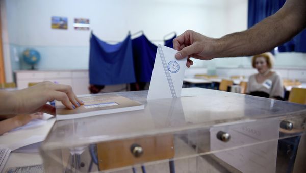 A man casts his vote at a polling station in the northern Greek port city of Thessaloniki, Sunday, July 5, 2015 A man casts his vote at a polling station in the northern Greek port city of Thessaloniki, Sunday, July 5, 2015 - Sputnik International