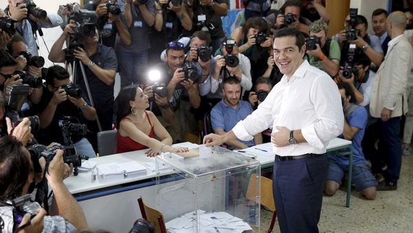 Greek Prime Minister Alexis Tsipras votes at a polling station in Athens, Greece July 5, 2015 - Sputnik International