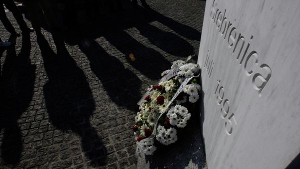 War veterans from the Balkan war of the 1990's stand near a memorial at the memorial center Potocari, near Srebrenica, 150 kms northeast of Sarajevo, Bosnia - Sputnik International