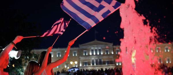 Young girls wave Greek flags Young girls wave Greek flags - Sputnik International
