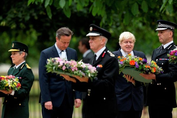 Britain's Prime Minister David Cameron, second from left, and London Mayor Boris Johnson, fourth from left, stand beside senior representatives from the ambulance, left, fire, third left, and police services as they wait to lay wreaths at the 7/7 memorial in Hyde Park in London, Tuesday, July 7, 2015. Britain's Prime Minister David Cameron, second from left, and London Mayor Boris Johnson, fourth from left, stand beside senior representatives from the ambulance, left, fire, third left, and police services as they wait to lay wreaths at the 7/7 memorial in Hyde Park in London, Tuesday, July 7, 2015. - Sputnik International