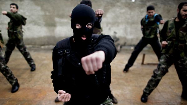 Syrian rebels attend a training session in Maaret Ikhwan, near Idlib, Syria in 2012. - Sputnik International