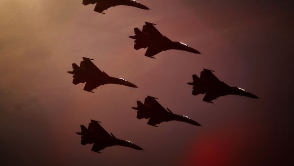 Russian Knights aerobatic team performs on SU-27 fighter aircraft during the Military Service Contract - Your Choice event in St. Petersburg. - Sputnik International