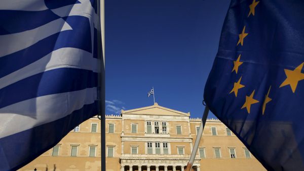 EU flag and a Greek flag EU flag and a Greek flag - Sputnik International