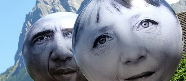 Balloons with the faces of German Chancellor Angela Merkel, left, and U.S. President Barack Obama Balloons with the faces of German Chancellor Angela Merkel, left, and U.S. President Barack Obama - Sputnik International