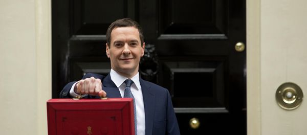 British Chancellor of the Exchequer George Osborne poses for the media with the traditional red dispatch box outside his official residence, 11 Downing Street in London, prior to unveiling the budget, Wednesday, July 8, 2015. British Chancellor of the Exchequer George Osborne poses for the media with the traditional red dispatch box outside his official residence, 11 Downing Street in London, prior to unveiling the budget, Wednesday, July 8, 2015. - Sputnik International